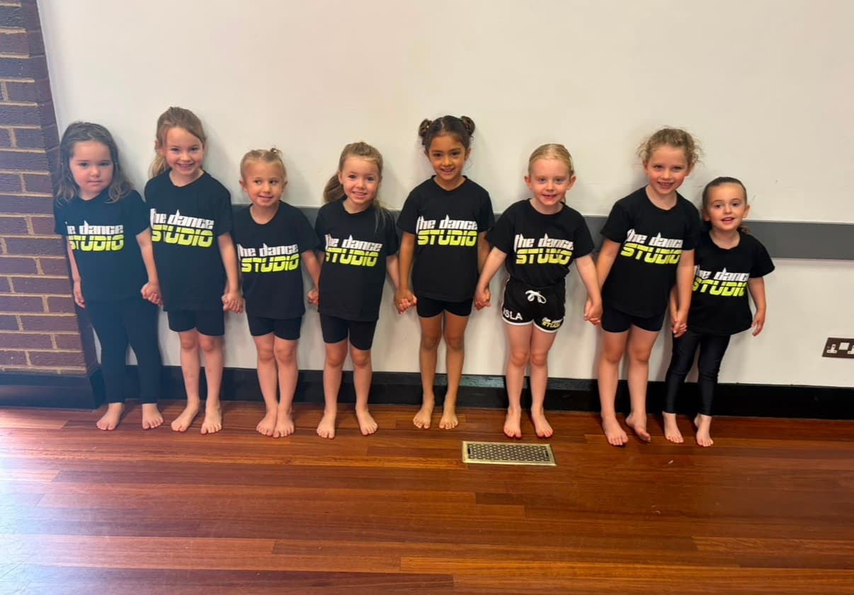 Younger dancers in The Dance Studio uniform